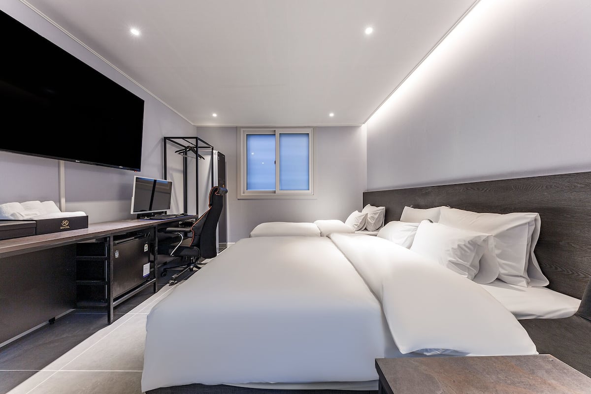 Premium bedding, down comforters, pillowtop beds, free minibar