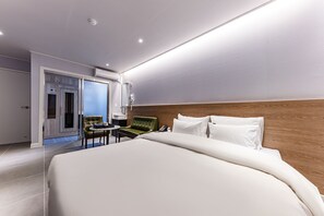 Habitació doble Deluxe | Roba de llit d'alta qualitat i cobrellits 
