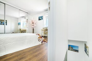 1 bedroom, desk, iron/ironing board, travel cot