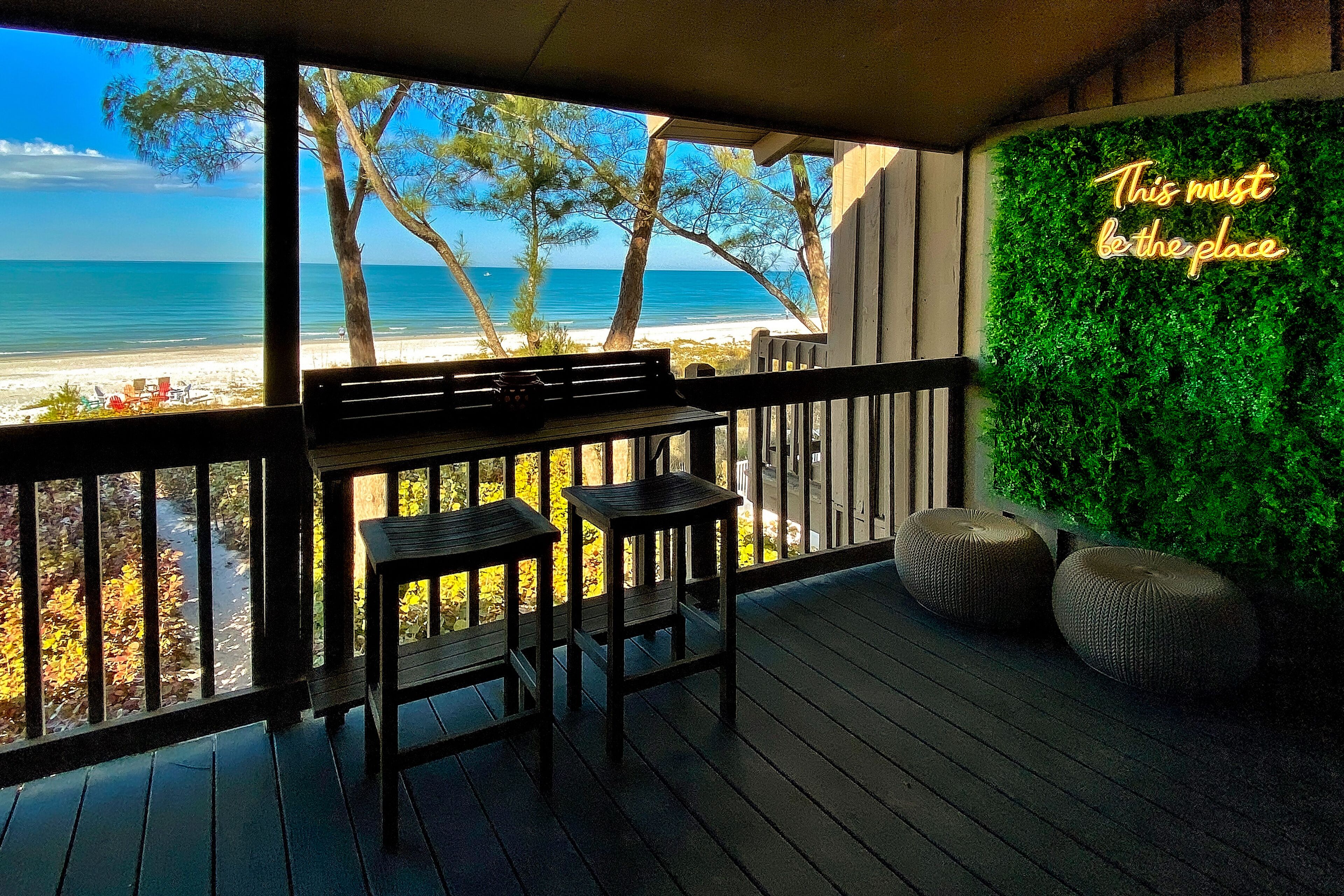 Chic Gulf-front condo - central AC, private W/D, beachfront balcony - 1 dog OK