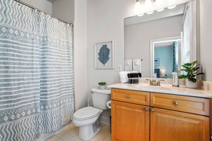 Bathtub, hair dryer, towels