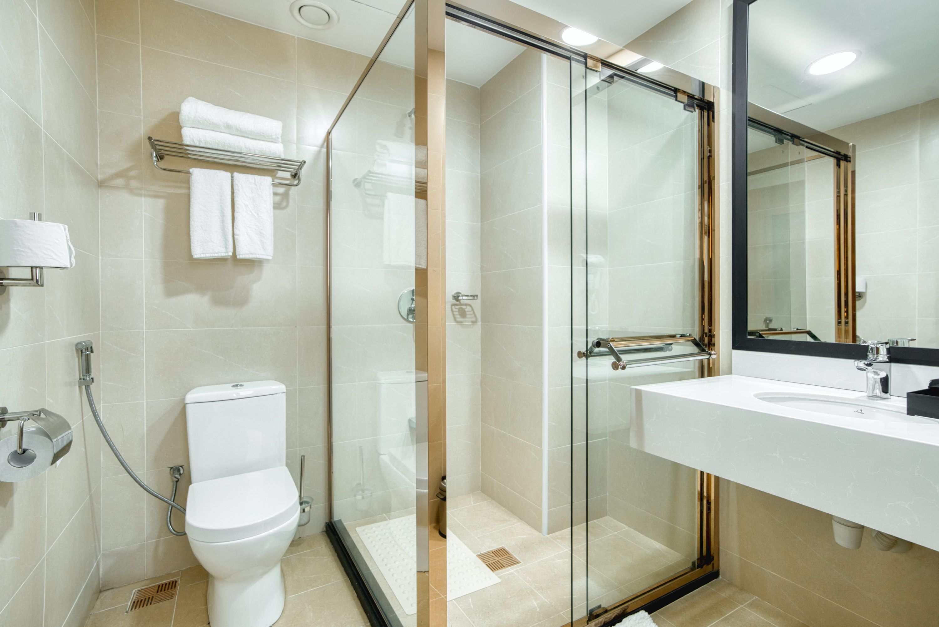 Shower, free toiletries, hair dryer, slippers