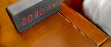 A digital clock displaying the time as 20:30 and temperature as 84°F.