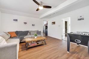 Smart TV, fireplace, foosball, books