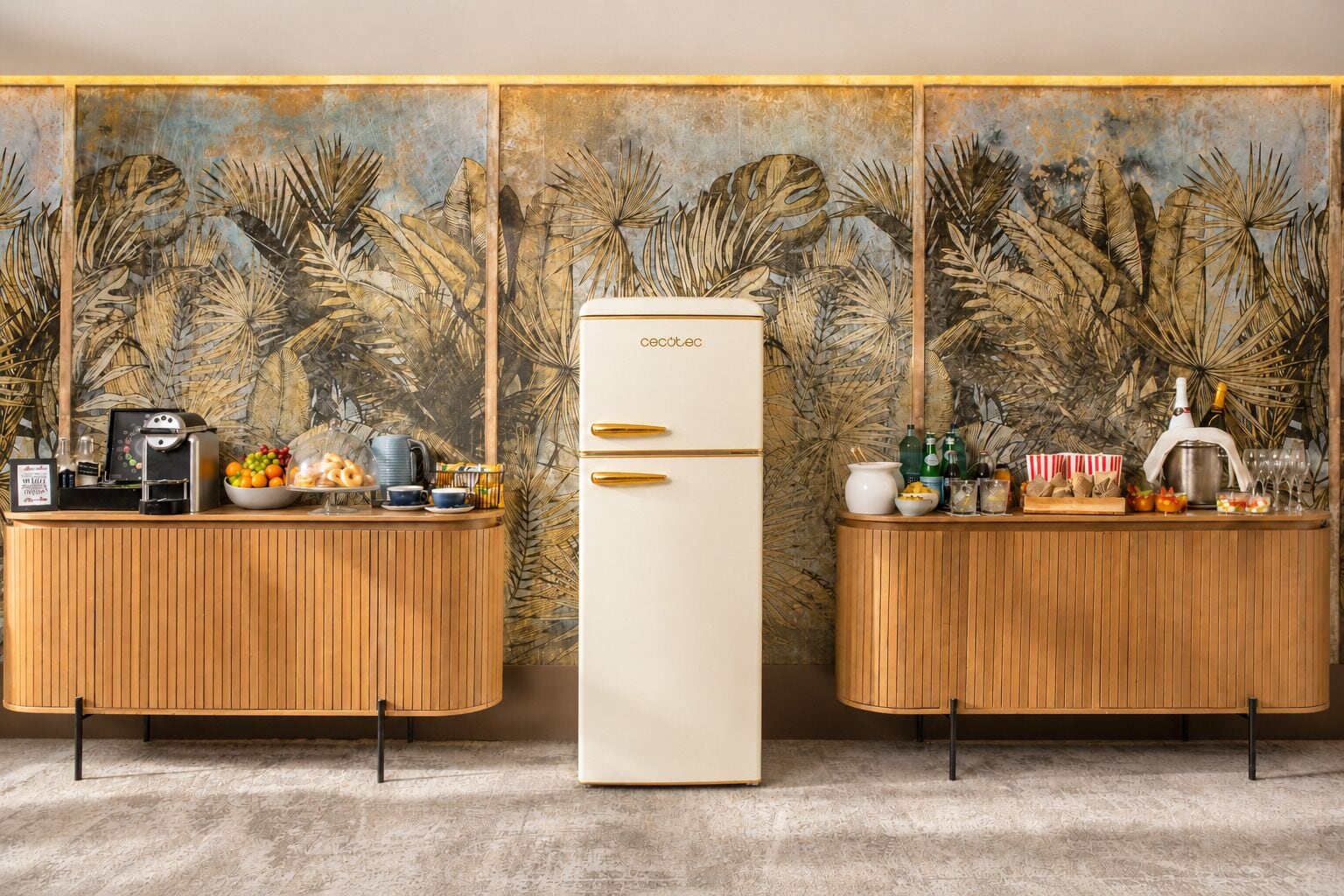 A modern kitchen with two wooden counters, a white refrigerator, and a tropical leaf-patterned wall.