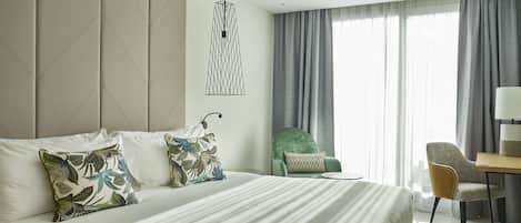 Down comforters, minibar, in-room safe, desk