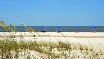 On the beach, sun-loungers, beach towels