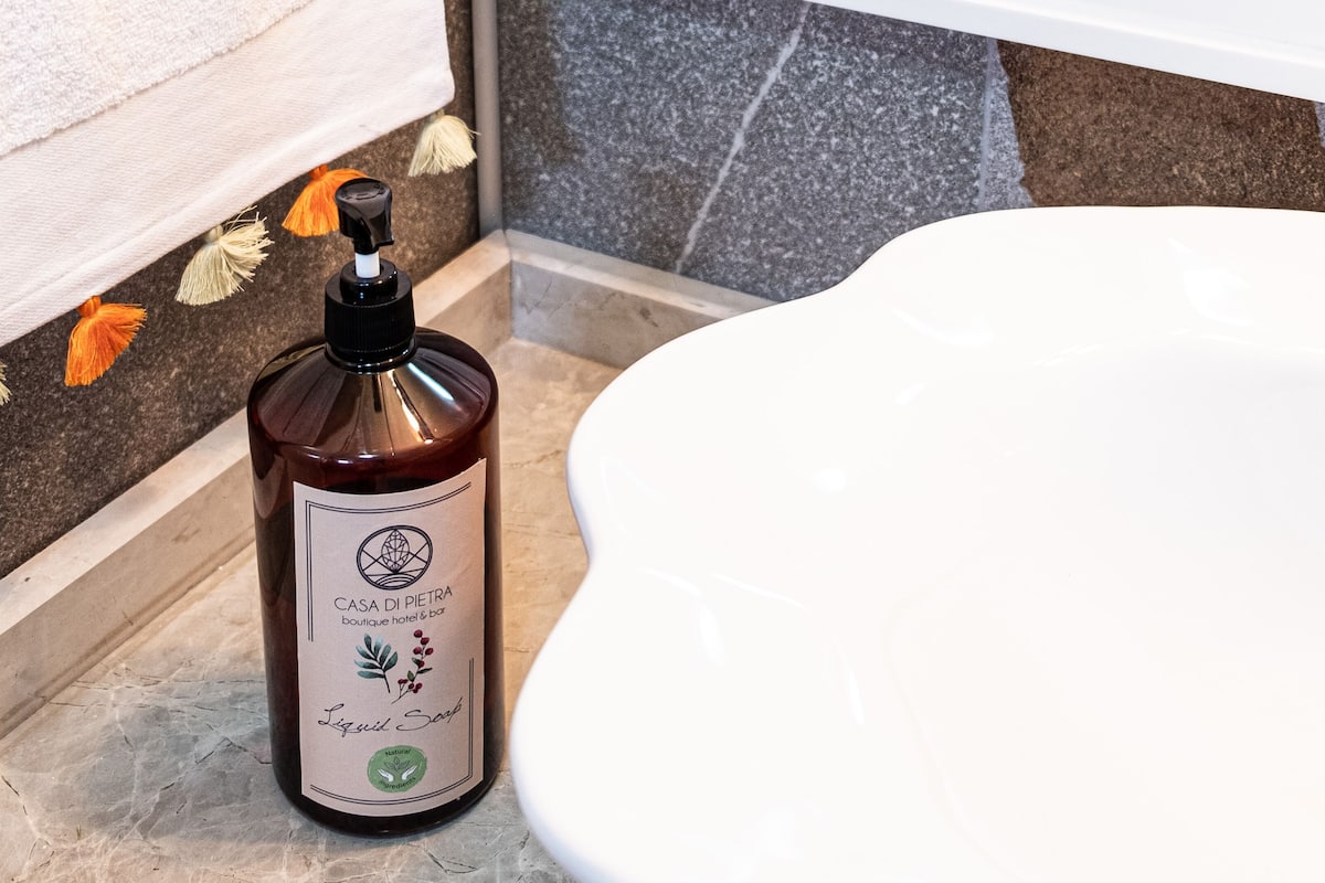 shower, rainfall showerhead, designer toiletries, hair dryer