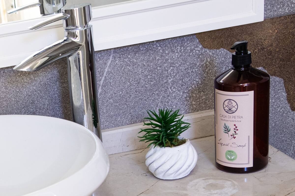 panoramic room | bathroom | shower, rainfall showerhead, designer toiletries, hair dryer