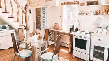 Design Apartment | Private kitchen | Full-size fridge, microwave, oven, stovetop