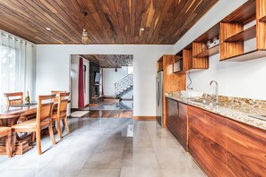 Microwave, stovetop, high chair, cookware/dishes/utensils