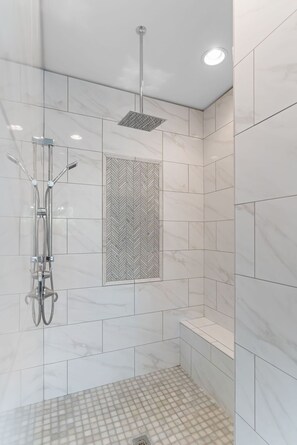 Combined shower/tub, hair dryer, towels, soap