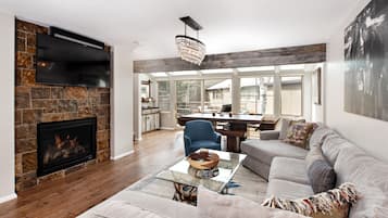 Townhome | Living area | 42-inch flat-screen TV with cable channels, TV, fireplace