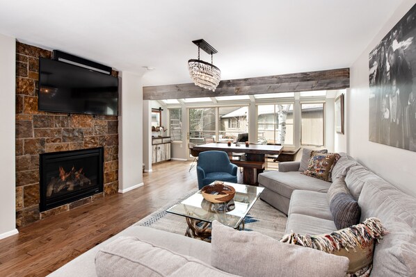 Townhome | Living area | 42-inch flat-screen TV with cable channels, TV, fireplace