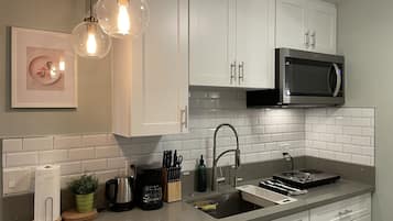 Fridge, microwave, coffee/tea maker, toaster