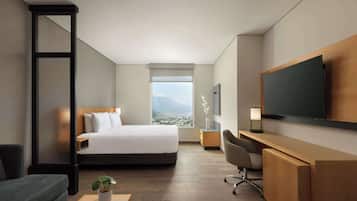 Habitación, 1 cama King size y sofá cama | Ropa de cama de alta calidad y minibar