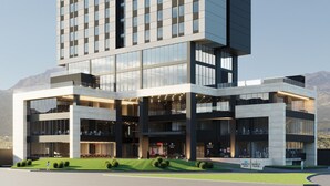 A modern hotel with a tall, rectangular structure, multiple floors, and a flat roof. - Hyatt House Monterrey Valle-san Pedro (San Pedro Garza García)