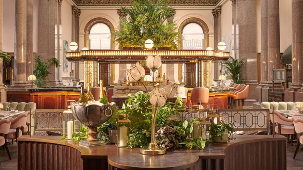 A luxurious lobby with a central bar, ornate ceiling, and classical architecture. - Gleneagles Townhouse (Edinburgh)