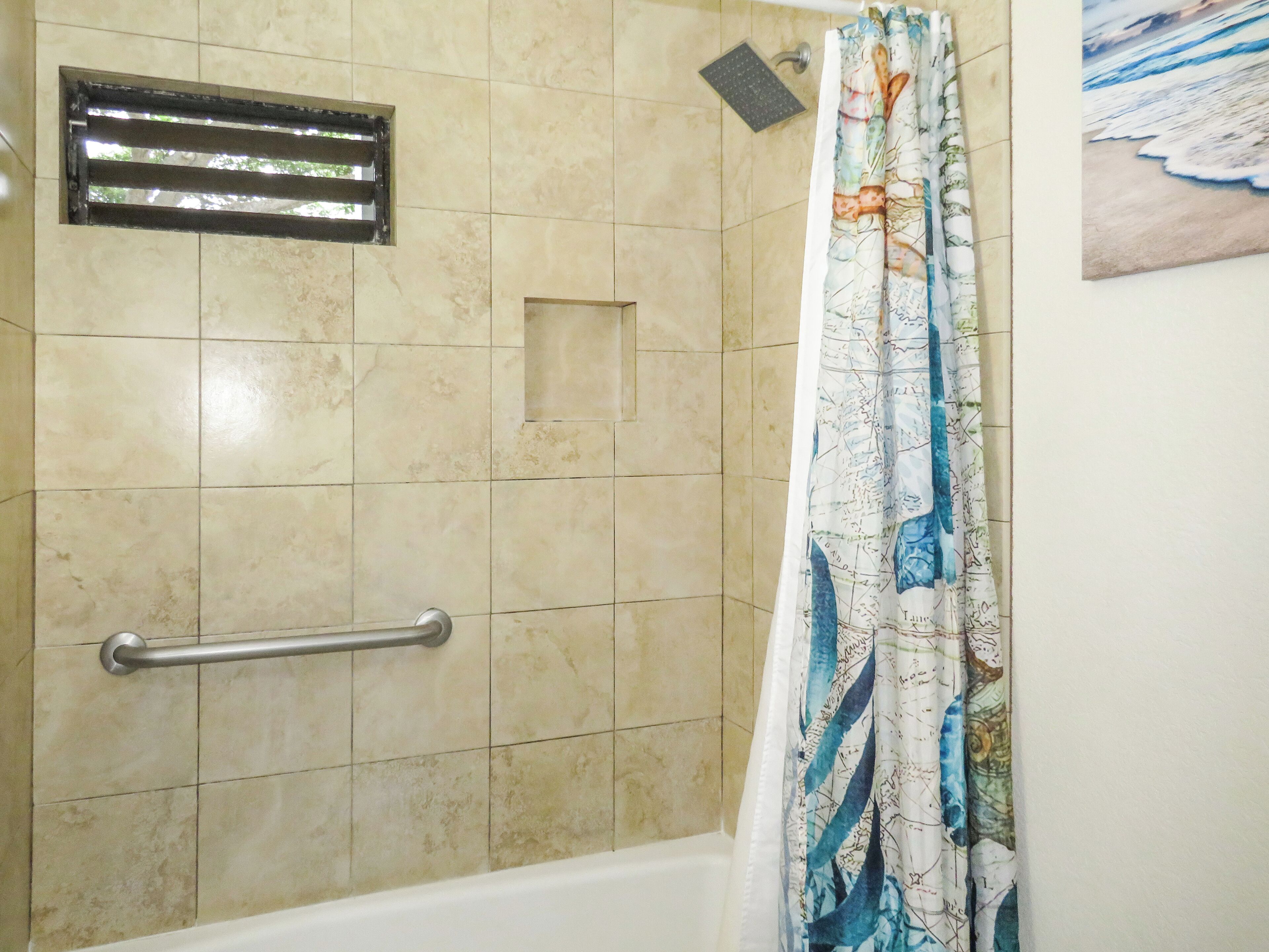 Combined shower/tub, hair dryer, towels, soap