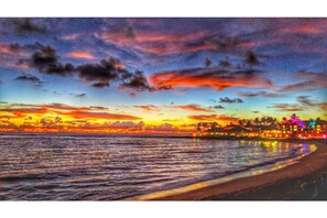 On the beach, sun loungers, beach towels