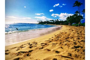 On the beach, sun-loungers, beach towels
