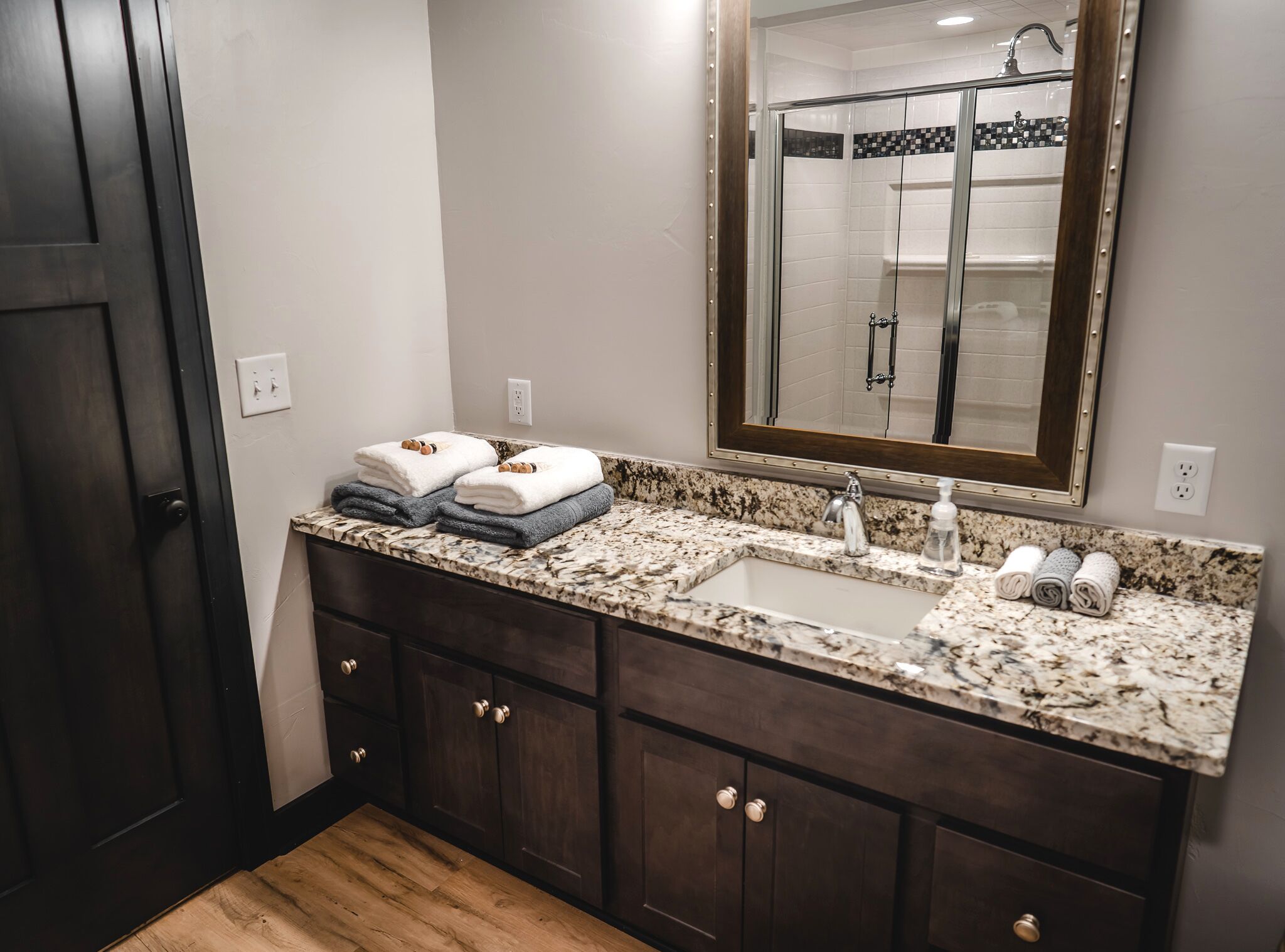 Combined shower/tub, hair dryer, towels, soap