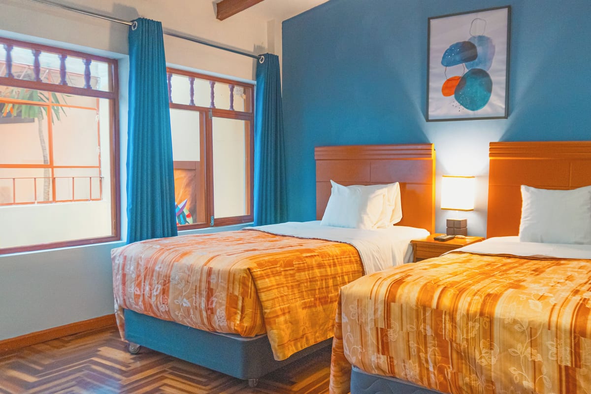 Chambre Économique avec lits jumeaux, 1 chambre | Literie de qualité supérieure, Wi-Fi gratuit, draps fournis