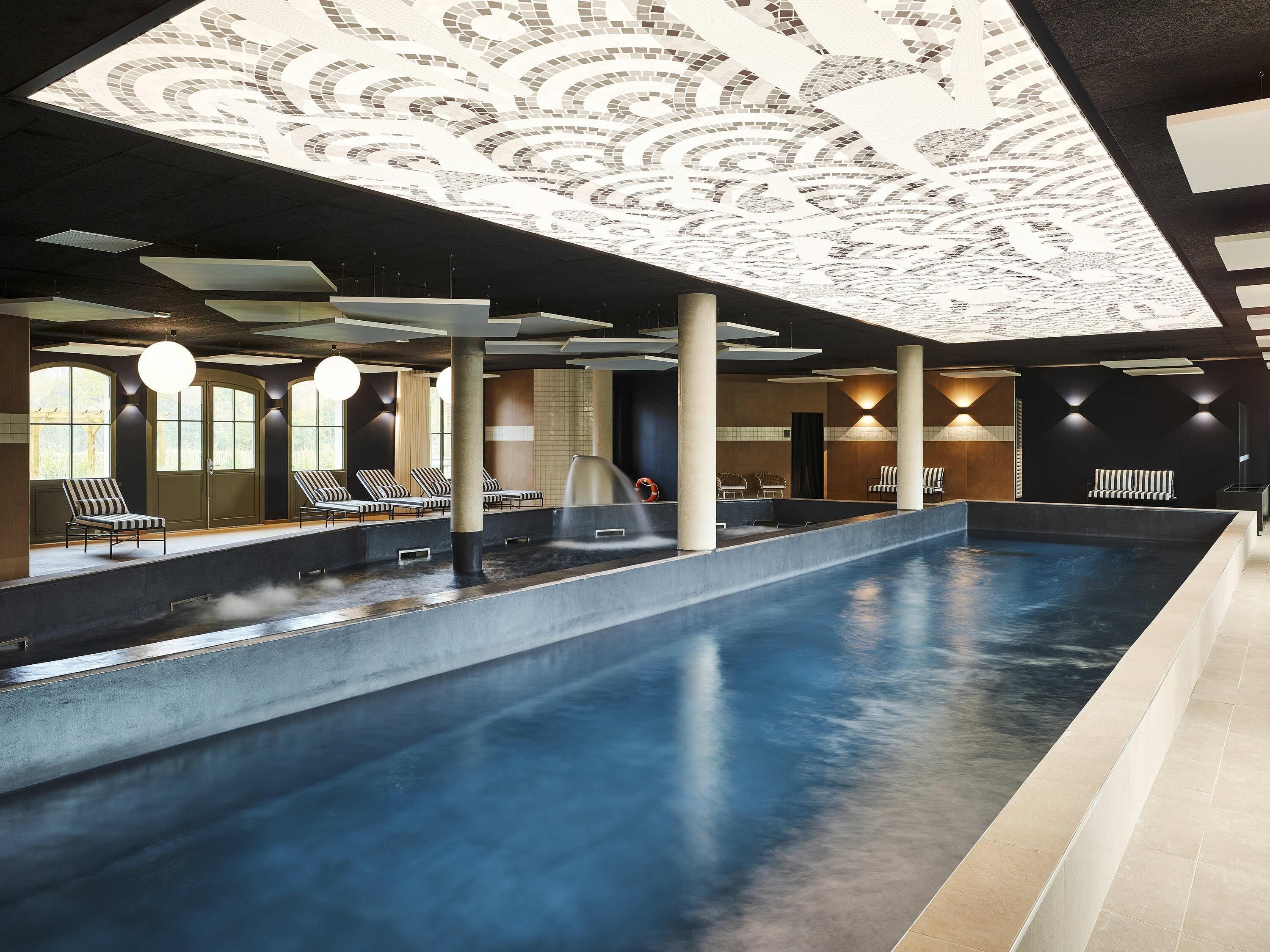 Indoor pool, open 9:30 AM to 7:30 PM, pool umbrellas, pool loungers