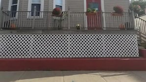 A two-story building with a red door and white-framed windows. - 5⭐️BEST PRICE⭐️ Whole apt.3 bdrm for 2-8, long term (Providence)