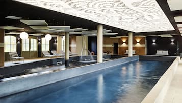 Indoor pool, open 9:30 AM to 7:30 PM, pool umbrellas, pool loungers