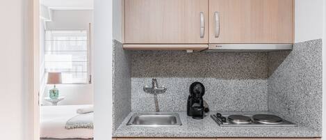 Fridge, microwave, coffee/tea maker, toaster