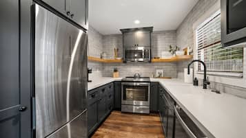 Family Cabin | Private kitchen | Coffee/tea maker, cleaning supplies