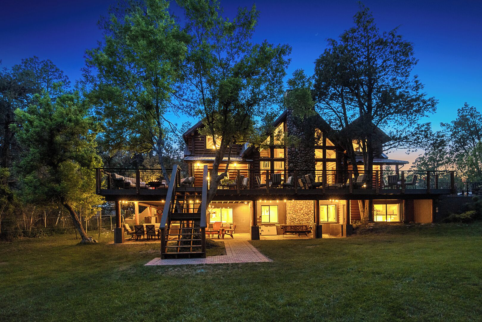 Twilight View of Luxury Log Cabin Retreat