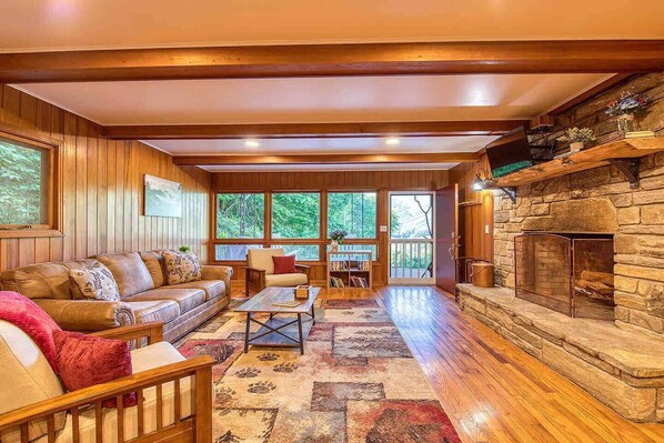 Smart TV, fireplace, DVD player, books