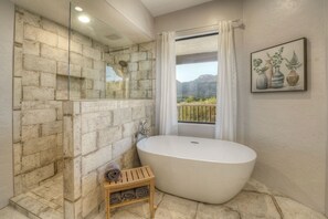 Bathtub, hair dryer, towels, soap