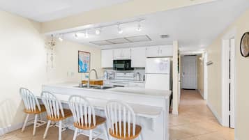Coffee/tea maker, fridge, microwave, oven