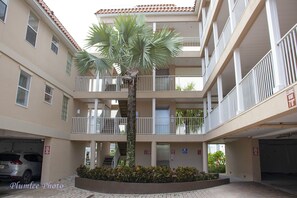 Stunning multi-story building with a central courtyard and balconies on each floor.