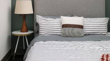 1 bedroom, desk, iron/ironing board, travel crib