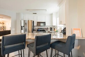 Fridge, microwave, oven, stovetop - Family Paradise: 5BR Kissimmee Home with Private Pool and Pet Friendly (Kissimmee)