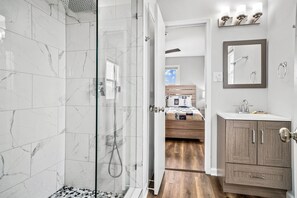 Combined shower/tub, hair dryer, towels, soap