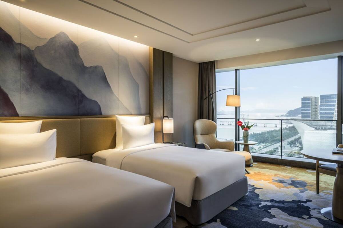 Down duvets, pillow-top beds, in-room safe, desk