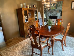 Enjoy meals in this cozy dining area with a round table and six comfortable chairs.