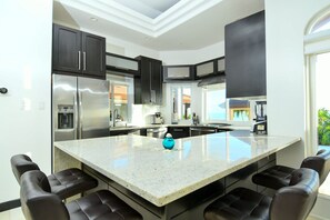 Fridge, microwave, oven, stovetop - Providenciales Beach Front Villa by Shoreline Turks & Caicos <br><br><br><br> (Leeward Settlement)
