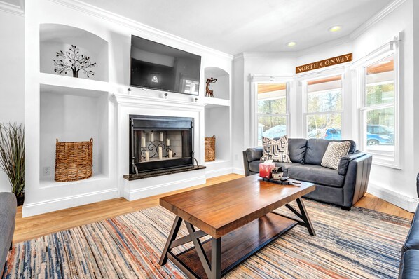 Smart TV, fireplace, video games, foosball
