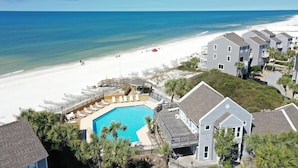 A beachfront hotel with a swimming pool, beach access, and multiple guest rooms. - Barrier Dunes 128 - 153 (Port St. Joe)