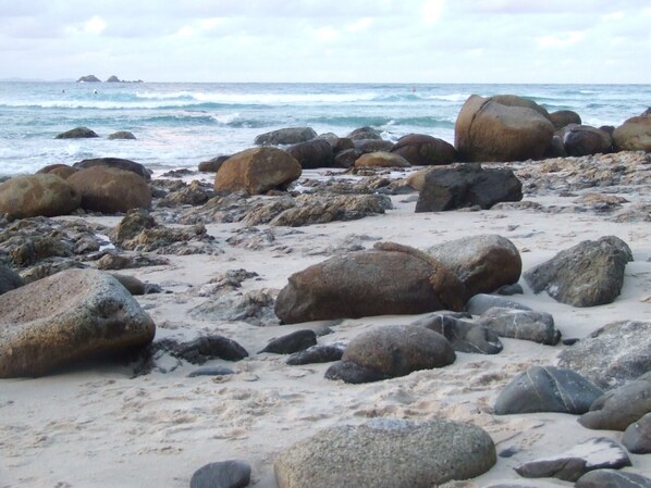 Enjoy the serene ocean views and dramatic rock formations along the beach.