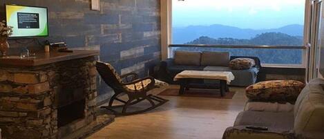 Superior Villa, 1 Bedroom | Living area | Fireplace