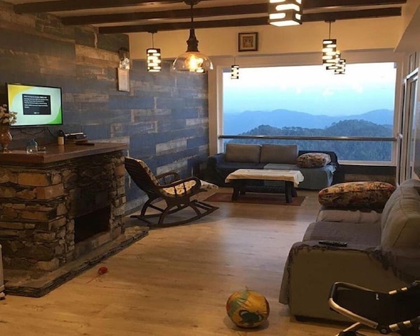 Superior Villa, 1 Bedroom | Living area | Fireplace - Veenu's Cottage (Dehradun)
