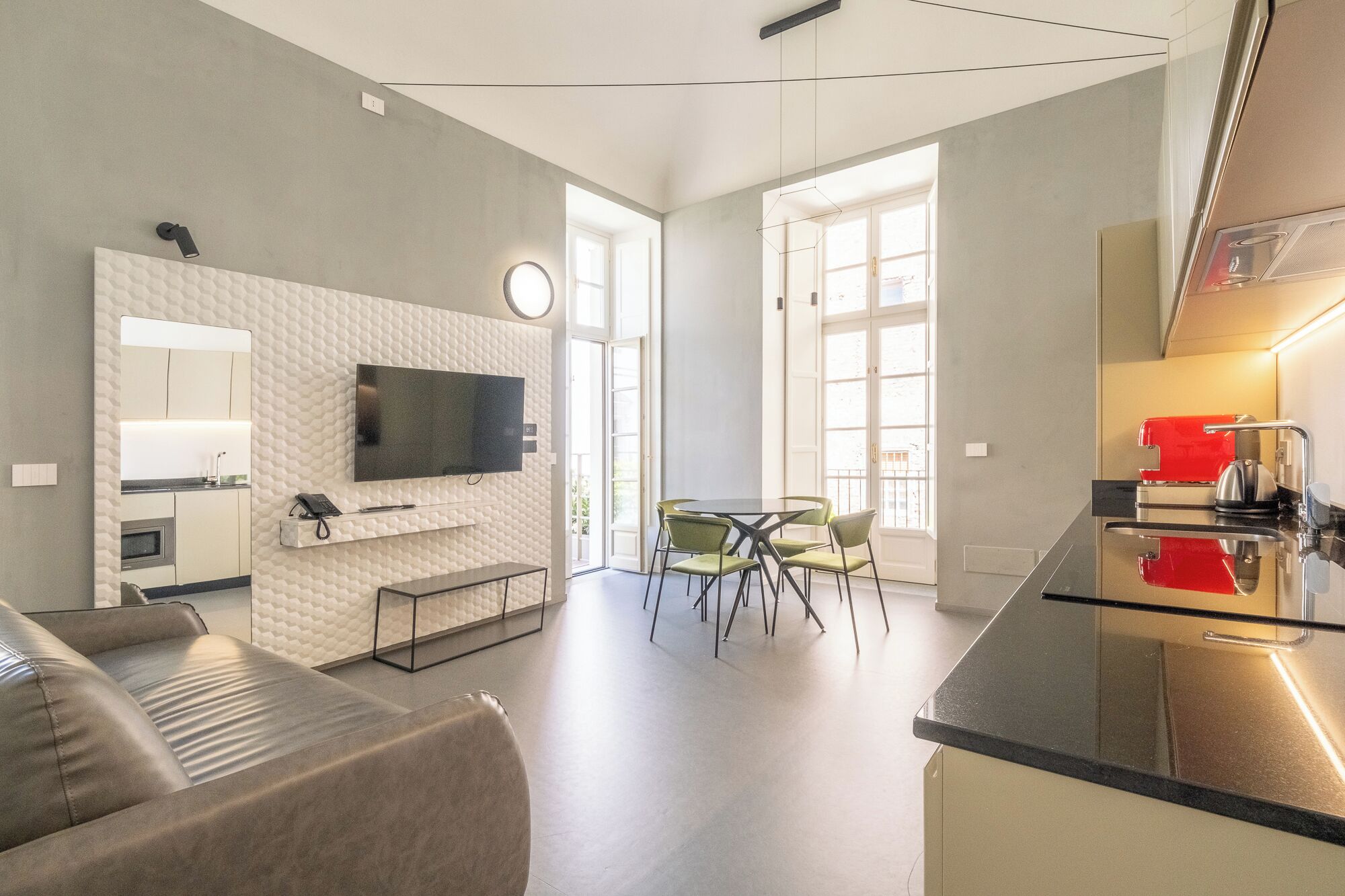 Suite Deluxe | Area soggiorno | TV a schermo piatto
