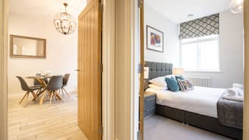 Family Apartment | Living area | 42-inch Smart TV with premium channels, TV, Netflix